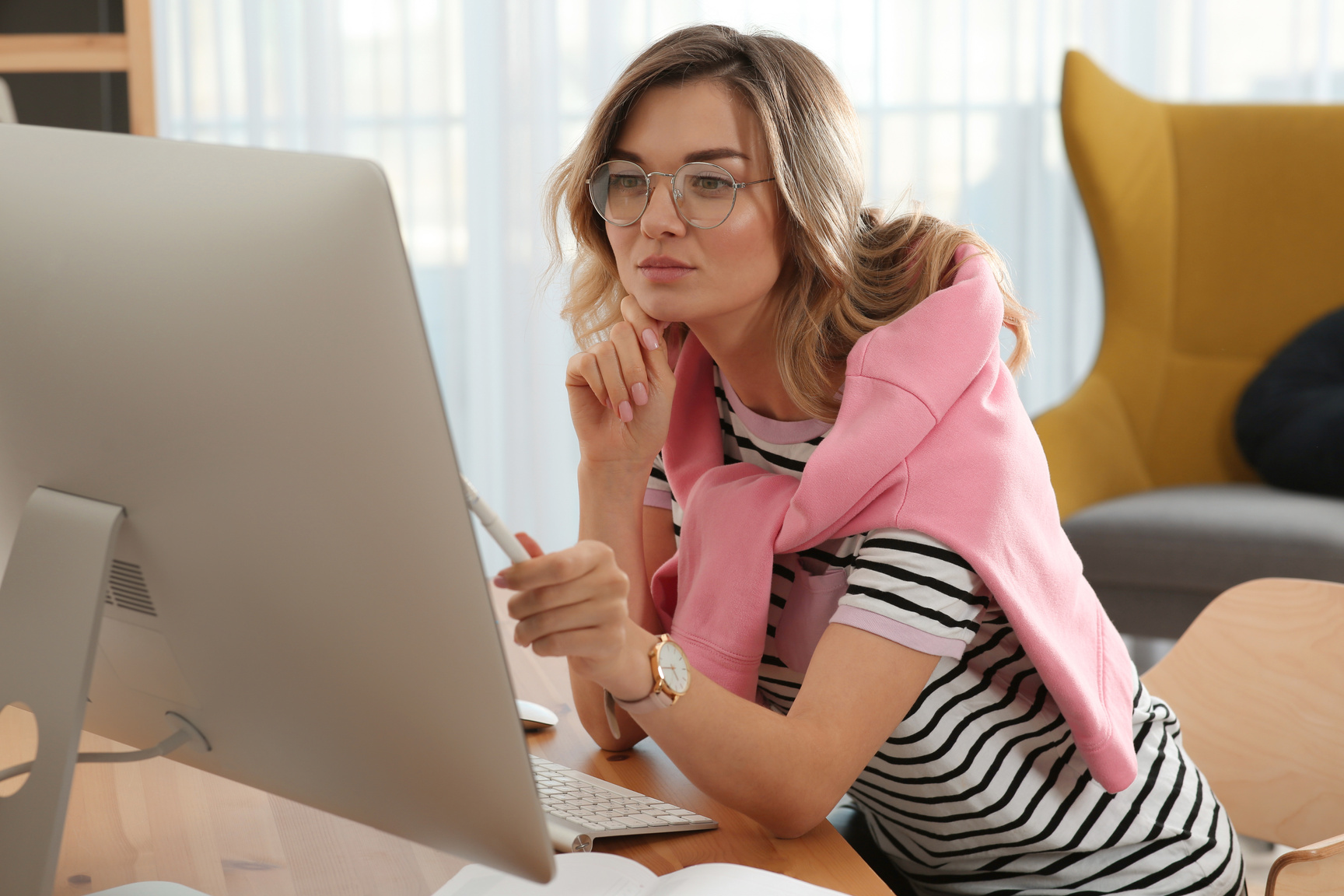 Online Test. Woman Studying with Computer at Home